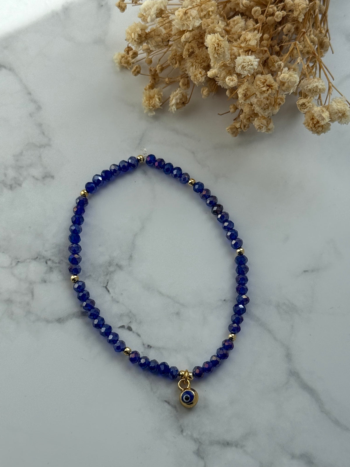 Perlenarmband mit Blauen Kristallperlen und Goldenen Perlen + Nazar Anhänger - 2369