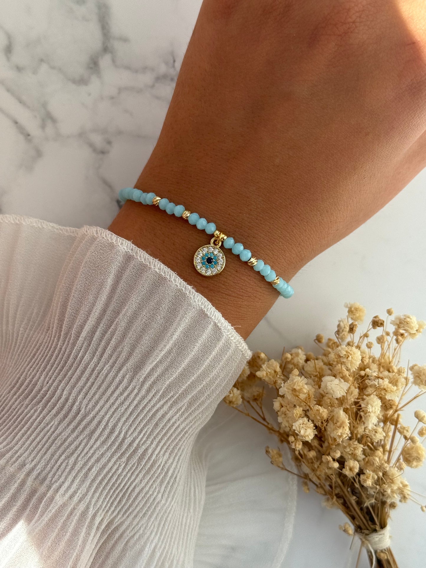 Perlenarmband mit Blauen Kristallperlen, Goldenen Perlen + Nazar Anhänger - 2320