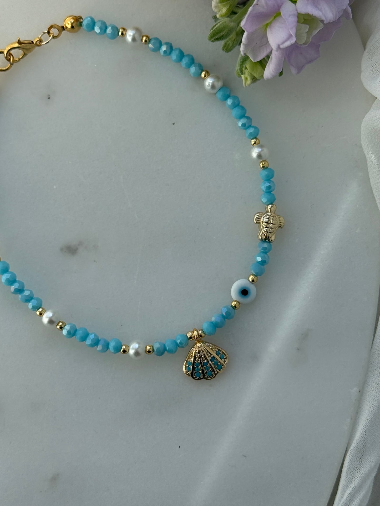Fußkette mit Blauen Kristallperlen + Muschel, Nazar und Schildkröten Anhänger - 2213