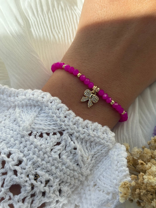 Perlenarmband mit Pinken Kristallperlen und Goldenen Perlen + Schleifen Anhänger - 2256