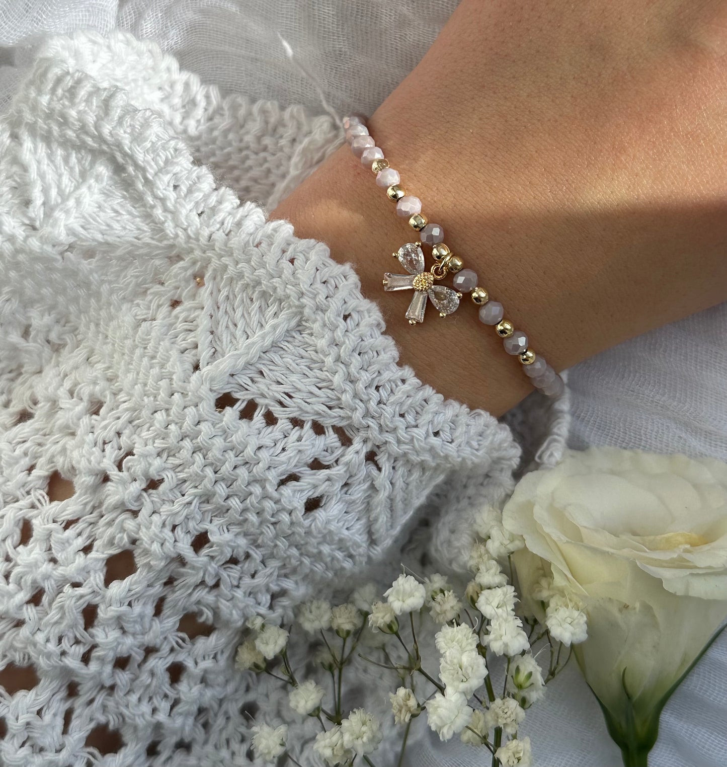 Perlenarmband mit Lila Kristallperlen und Schleifen Anhänger - 10572